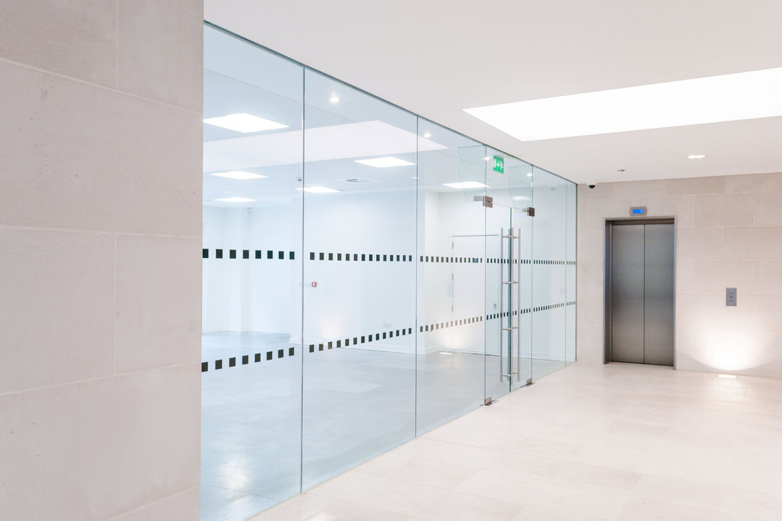 Light bright office building with glass interior walls