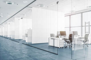 All white and glass office building. Light bright and airy