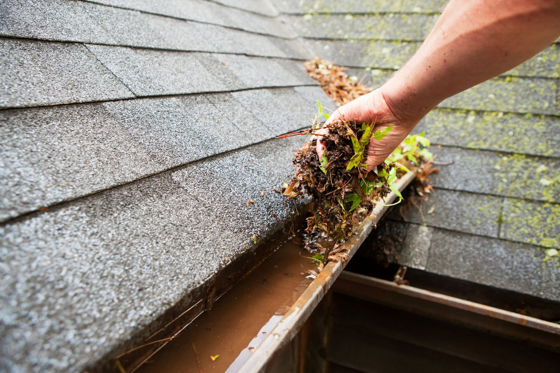 Cleaning Gutters for roof drainage